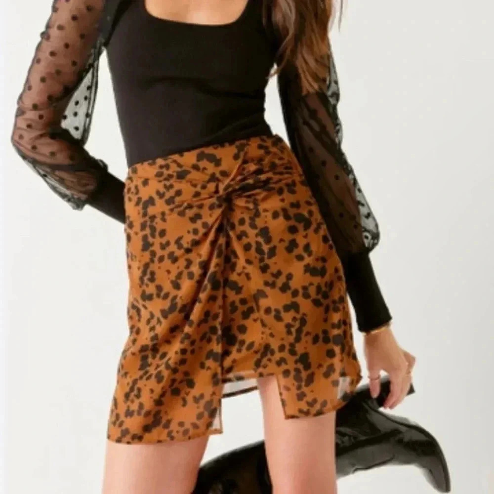 Francesca's Cheetah Print Mini Skirt Extra Small Large